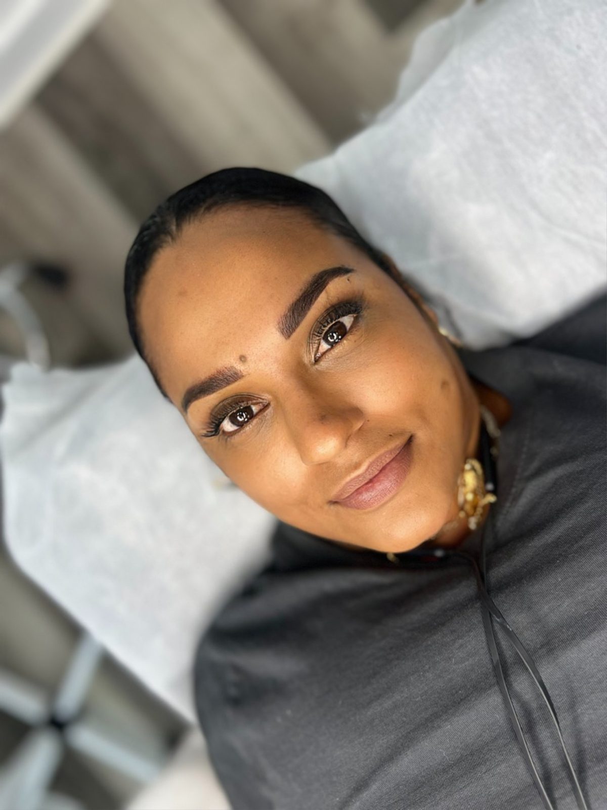 Client portrait after a session at MK Permanent Makeup