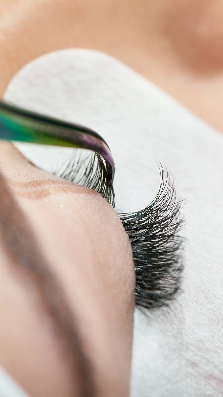 Eyelash treatment in progress — close-up