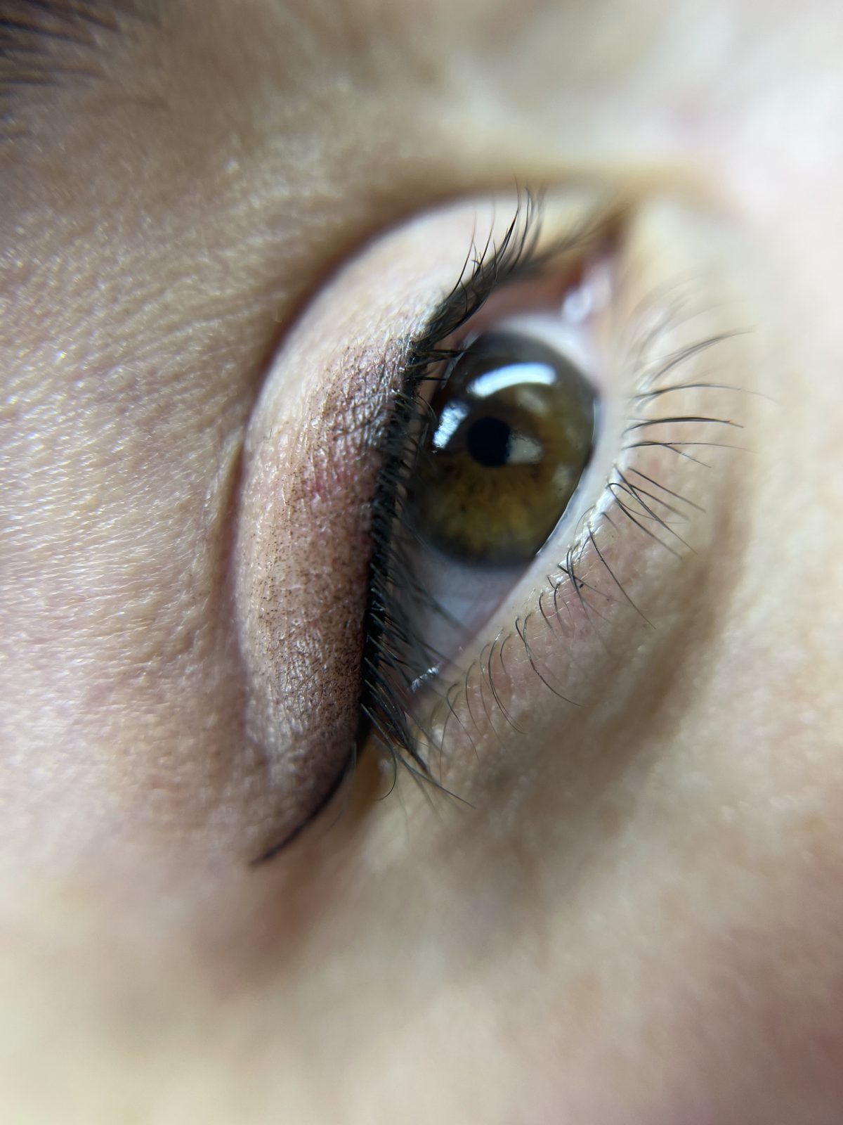 Permanent eyeliner result — close-up