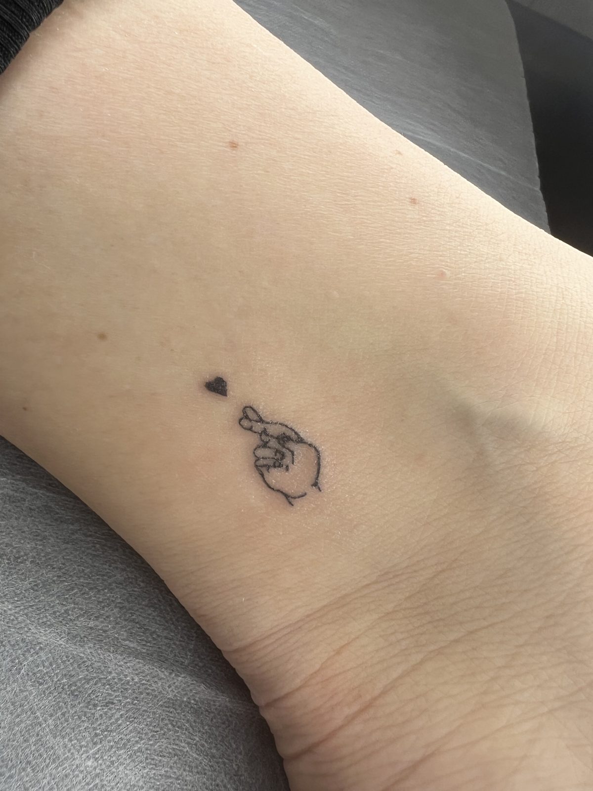 Mini tattoo on the ankle