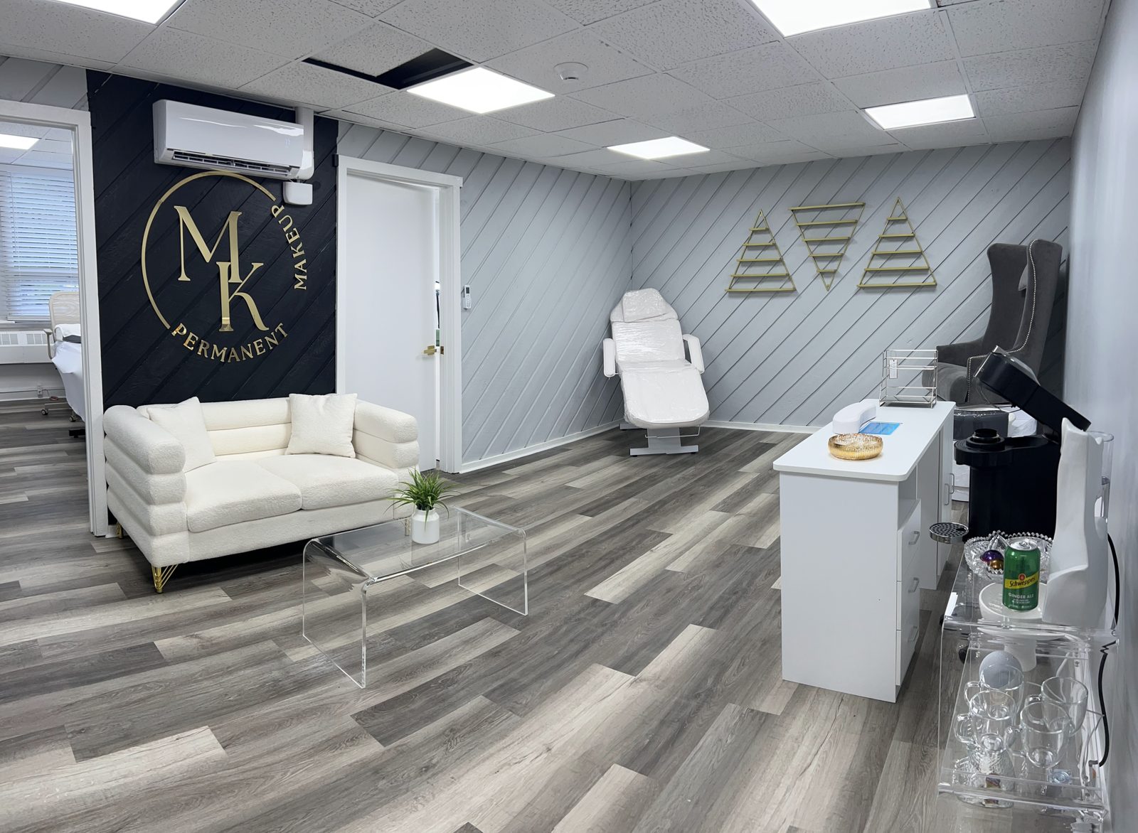 Studio interior with the MK logo wall